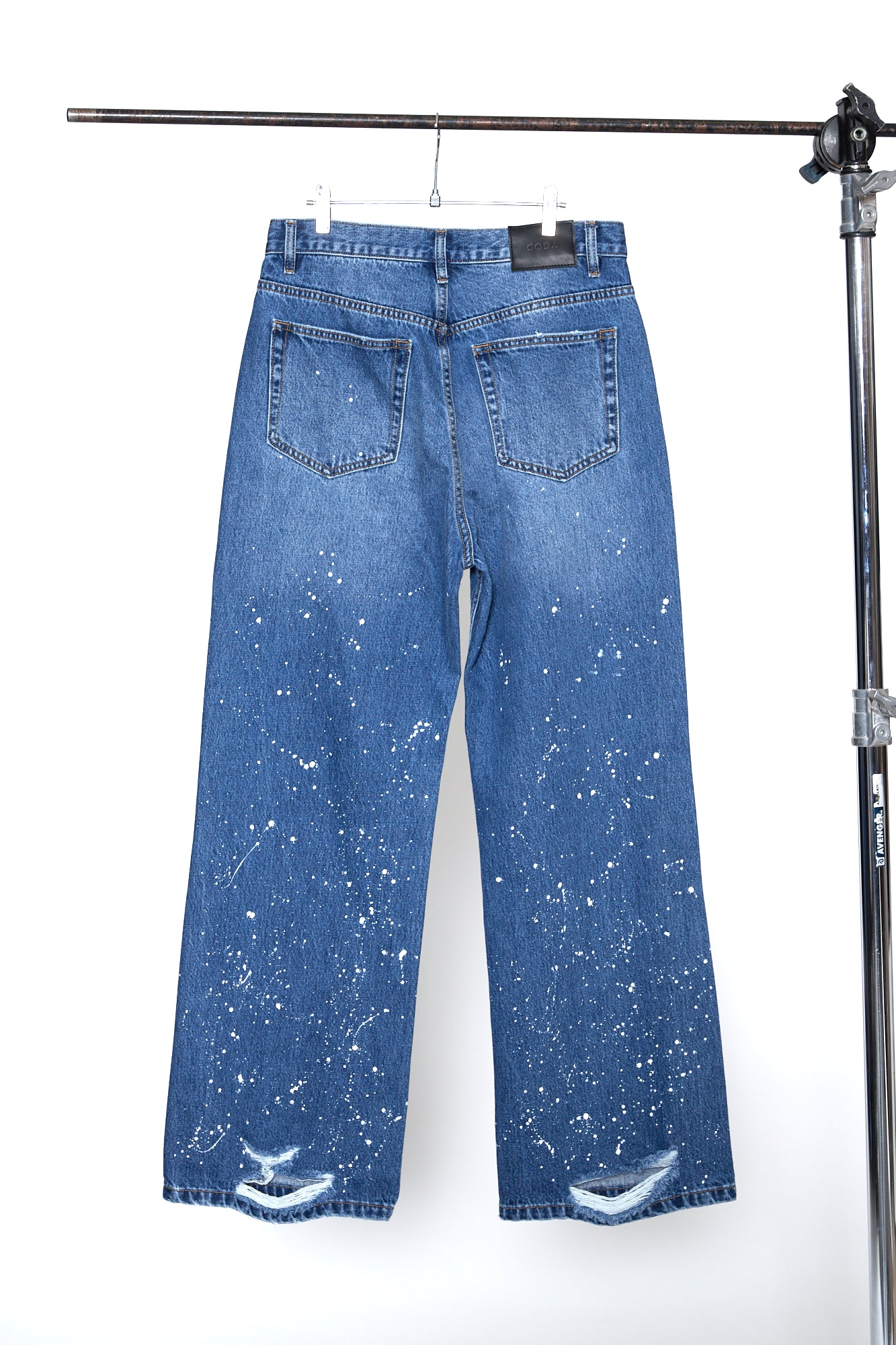 Load image into Gallery viewer, INDIGO WASHED SPLATTER DISTRESSED EXTENDED CUT FLARED JEANS