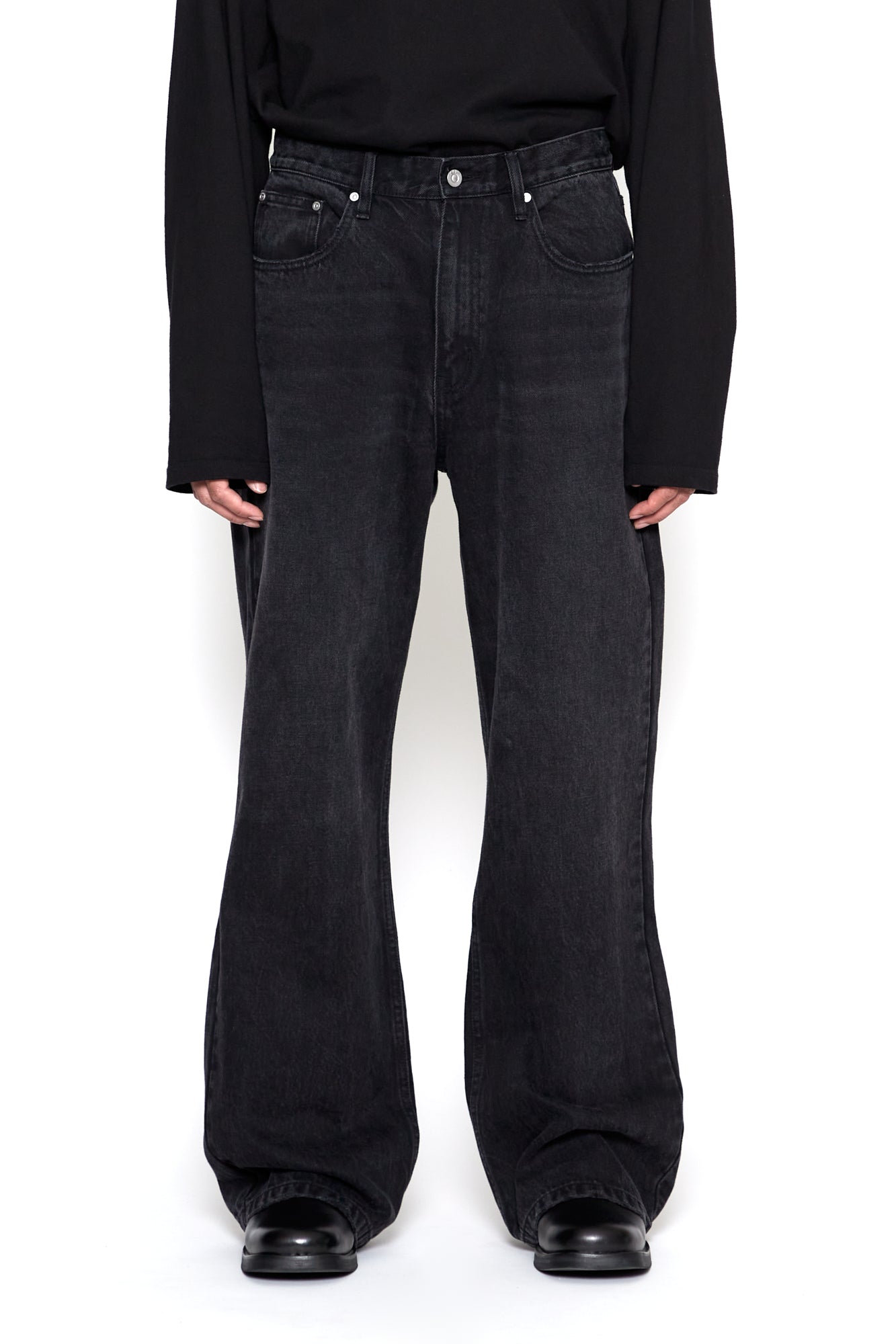 BLACK WASHED DISTRESSED EXTENDED CUT FLARED JEANS