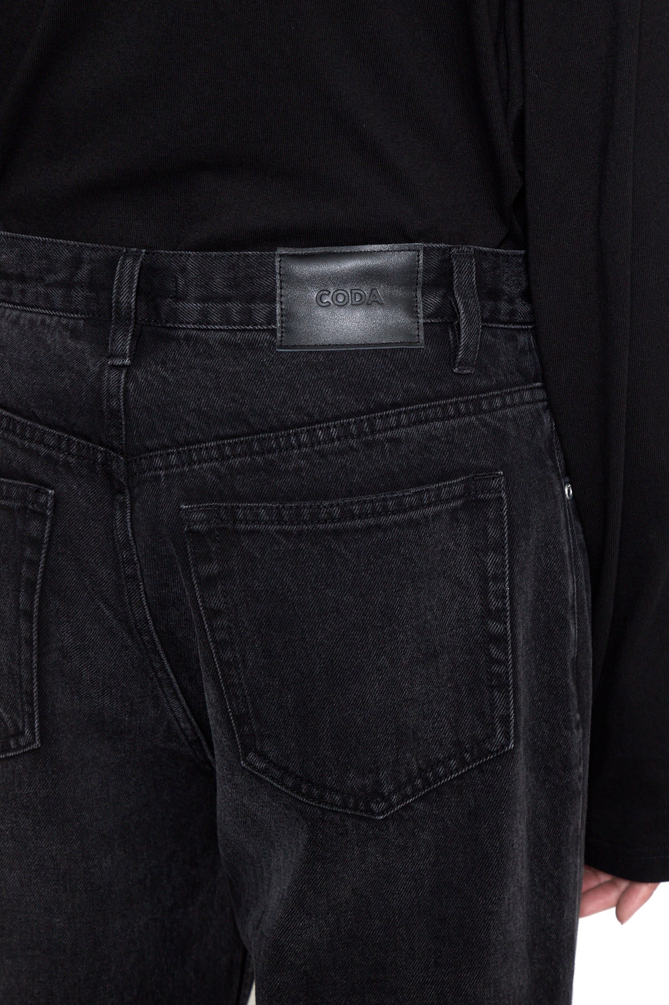 BLACK WASHED DISTRESSED EXTENDED CUT FLARED JEANS