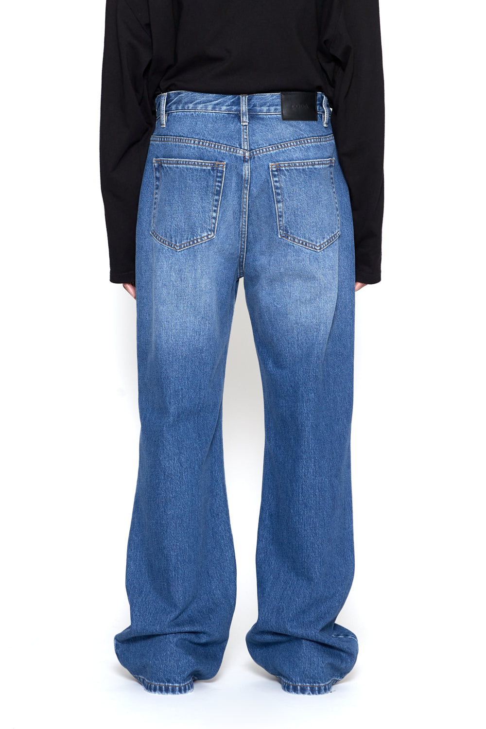 INDIGO WASHED DISTRESSED EXTENDED CUT FLARED JEANS