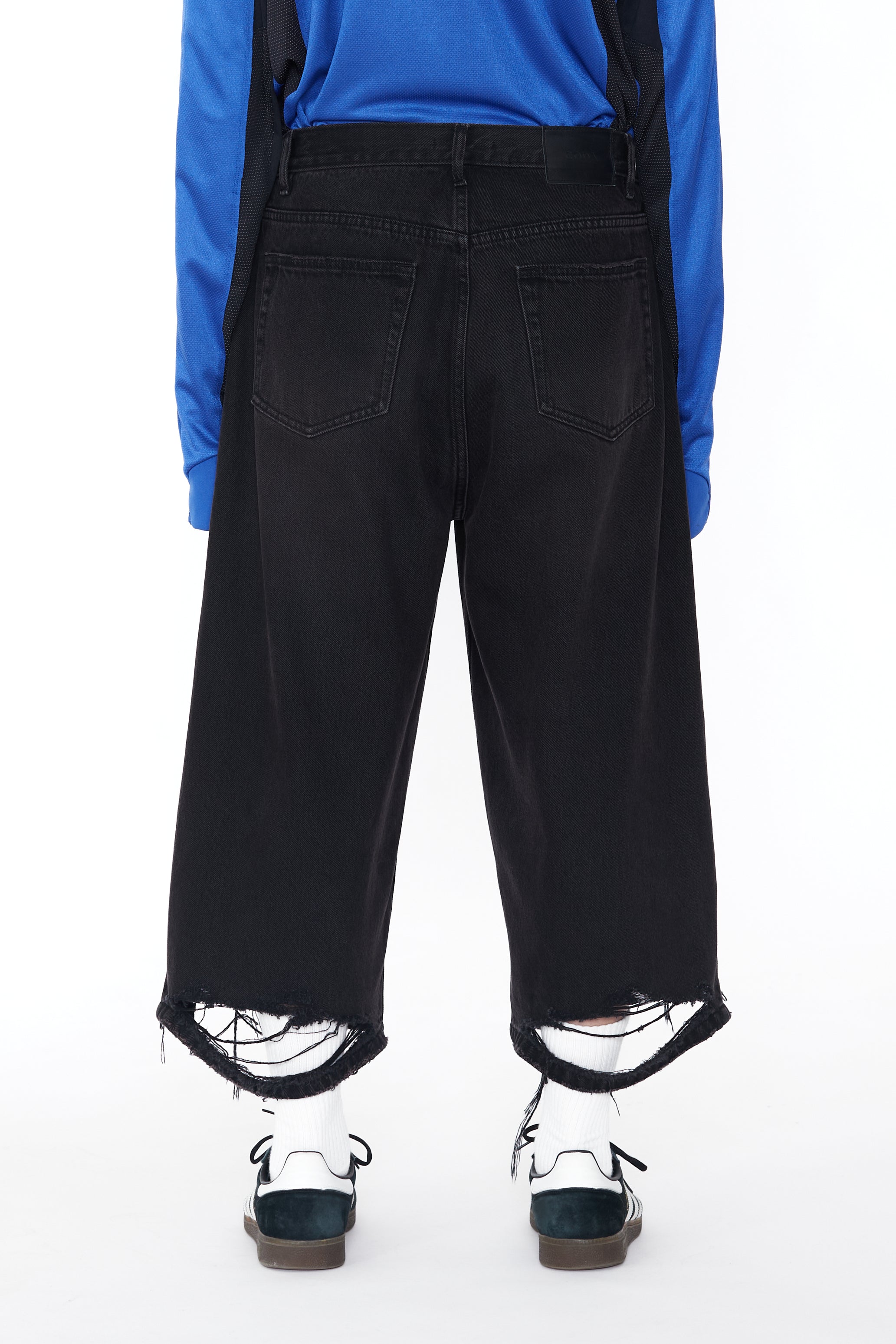 BLACK WASHED DESTROYED CUT OUT JEANS