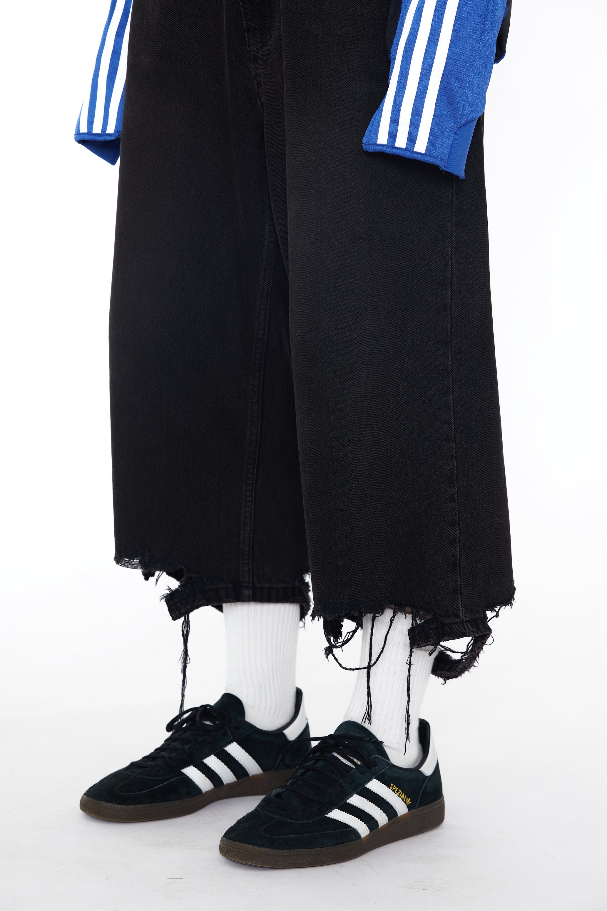 BLACK WASHED DESTROYED CUT OUT JEANS