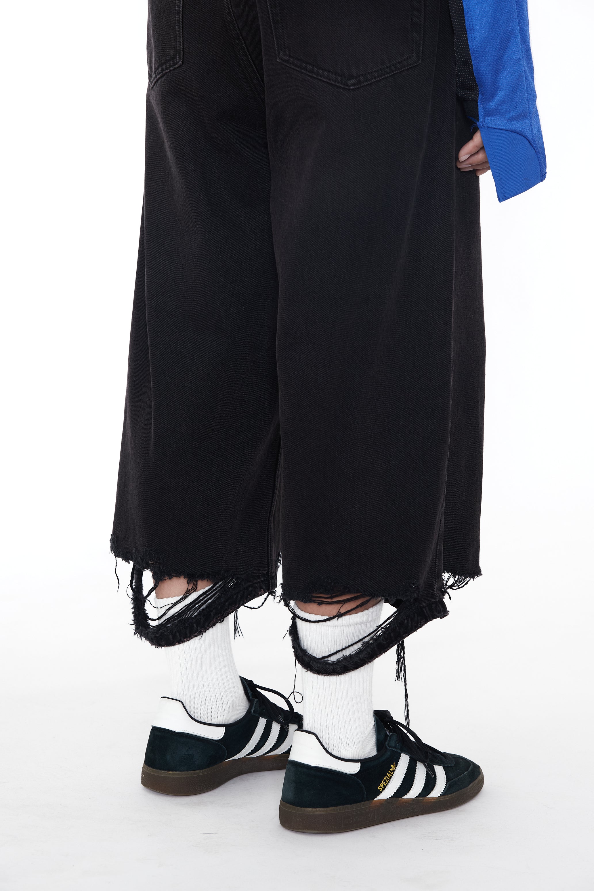 BLACK WASHED DESTROYED CUT OUT JEANS