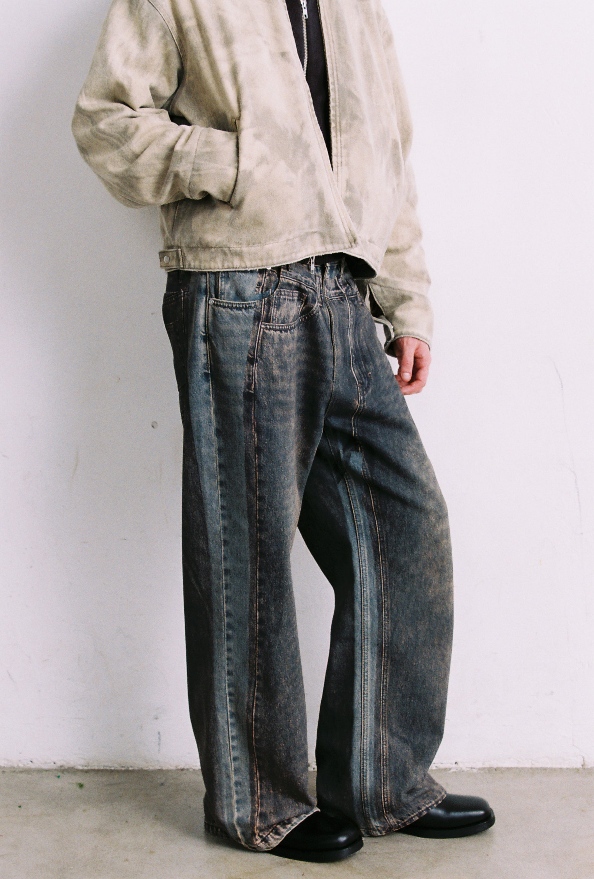 GREY ACID WASH DUAL EXPOSURE BREAK CUT FLARED JEANS